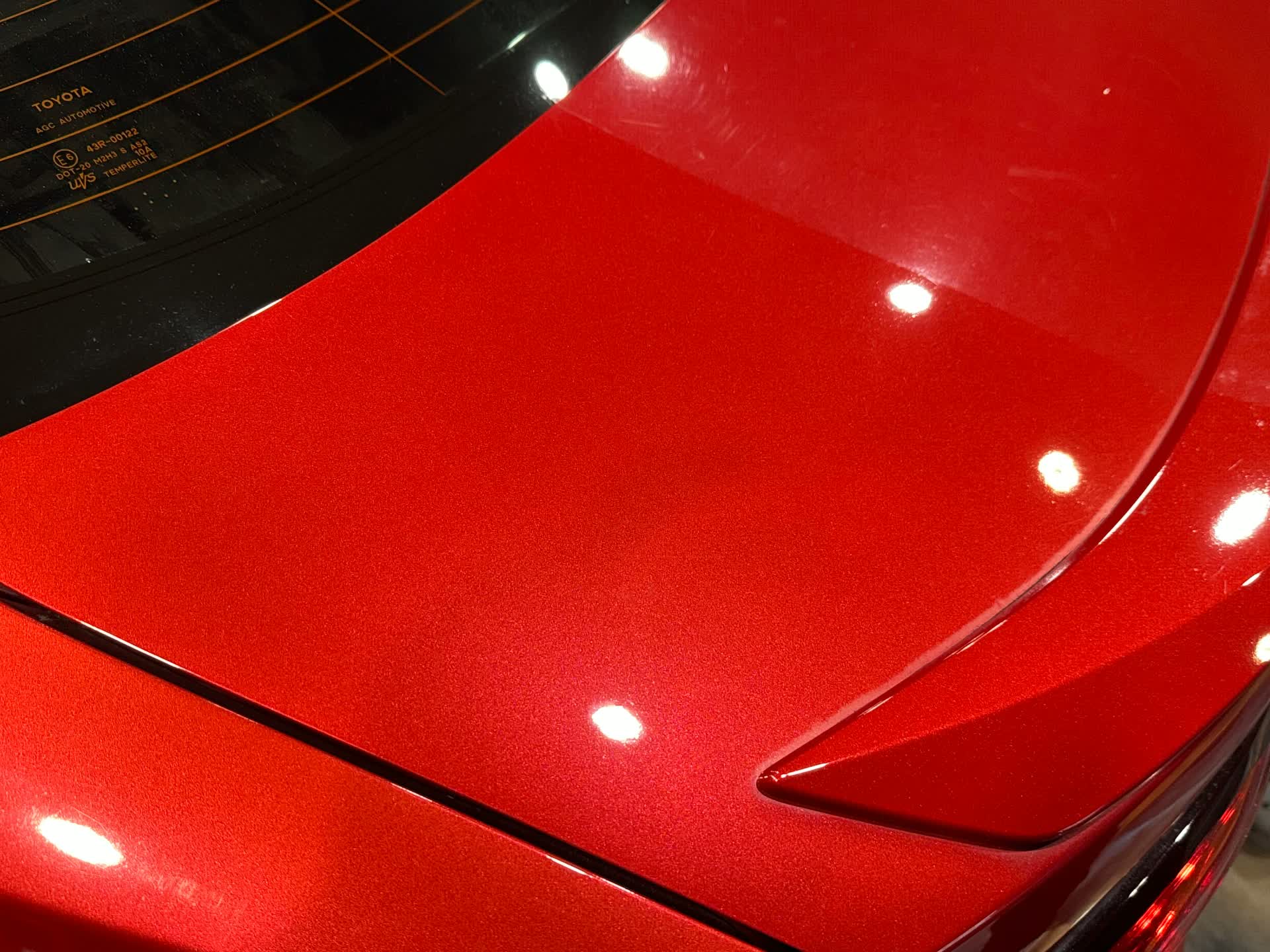 Flawless gloss on red metallic paint after Motorcity Detailing paint correction