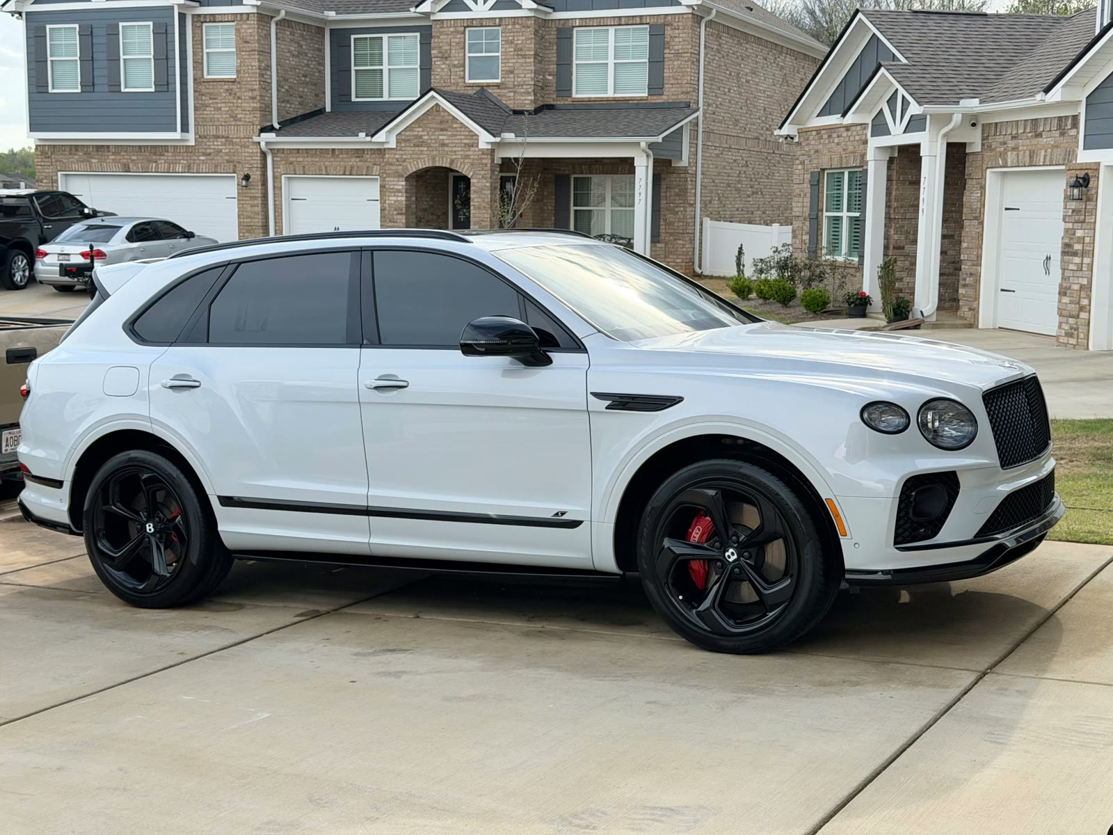 Side profile of a Bentley Bentayga SUV after exterior detailing
