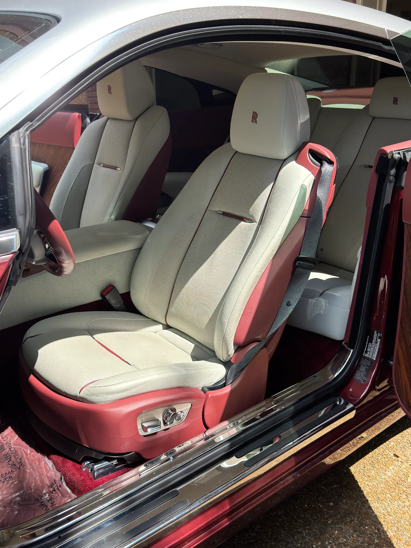Cream leather seats cleaned and conditioned in a Rolls-Royce Wraith