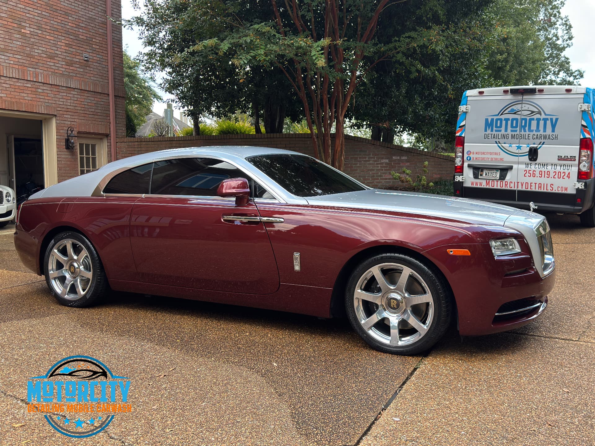 Mobile detailing on a Rolls-Royce Wraith beside the Motorcity Detailing van