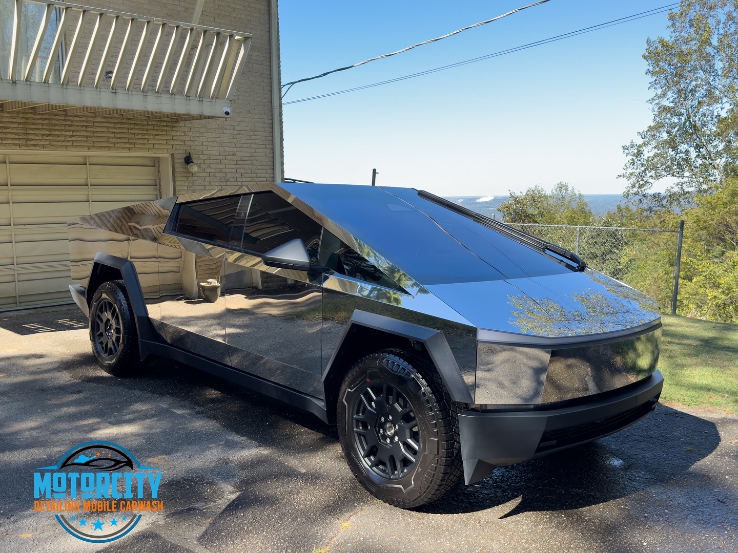Paint correction polishing the stainless panels of a Tesla Cybertruck